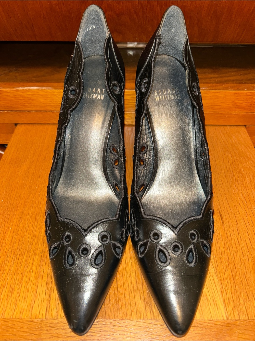 Stuart Weitzman Black Pointed-Toe Leather Pumps with Laser Cut Details